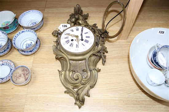 A 19th century French ormolu cartel clock, with enamelled Roman dial, overall height 49cm